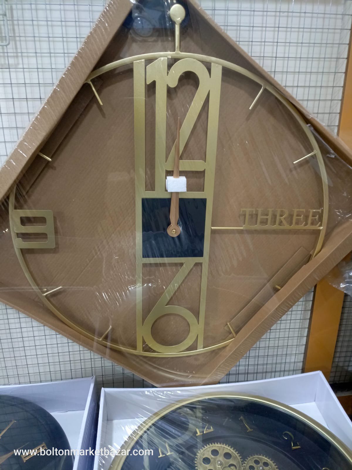 2026/07/1011085745.jpg New Look Imported Metal Body Motive Wall Clock 24*24 Inch - Image 1