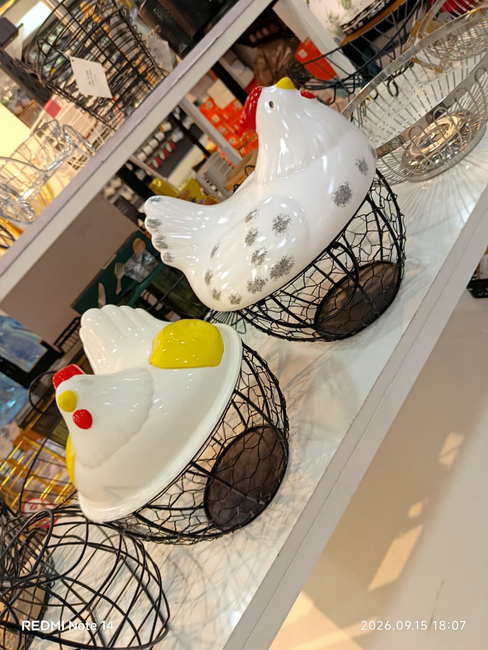 2026/09/1000128310.jpg Hen-shaped egg storage basket with a ceramic lid and wire nest base - Image 1