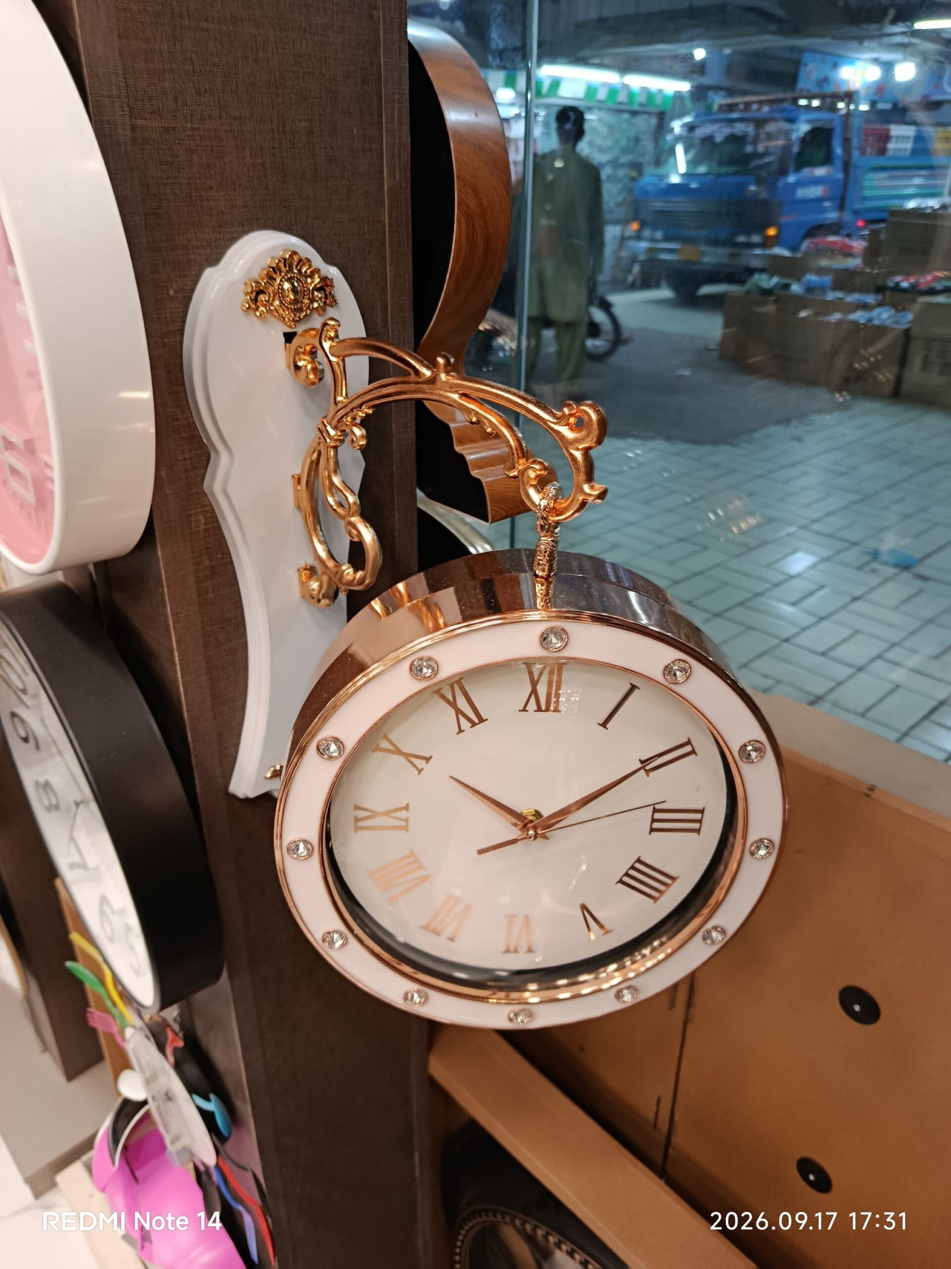 2026/09/1000129995-scaled.jpg Premium Quality double sided clock - Image 1